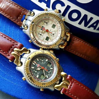 Side-by-side cream and anthracite dials -- Original S25.206C (Top) and First Revision S25.206 (Bottom)